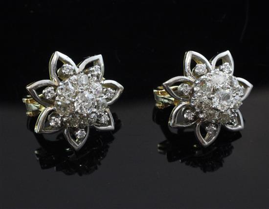 A pair of gold and diamond cluster ear clips,